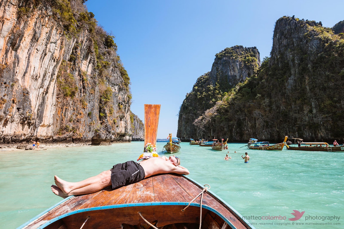 men chill on boat.jpg