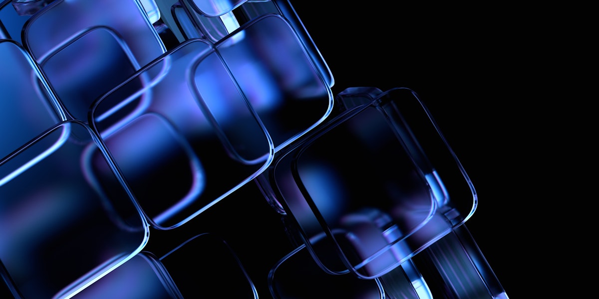 Translucent blue glass blocks stacked and overlapping on a dark background, cover image for an article on RAG versus fine-tuning for regulated industries