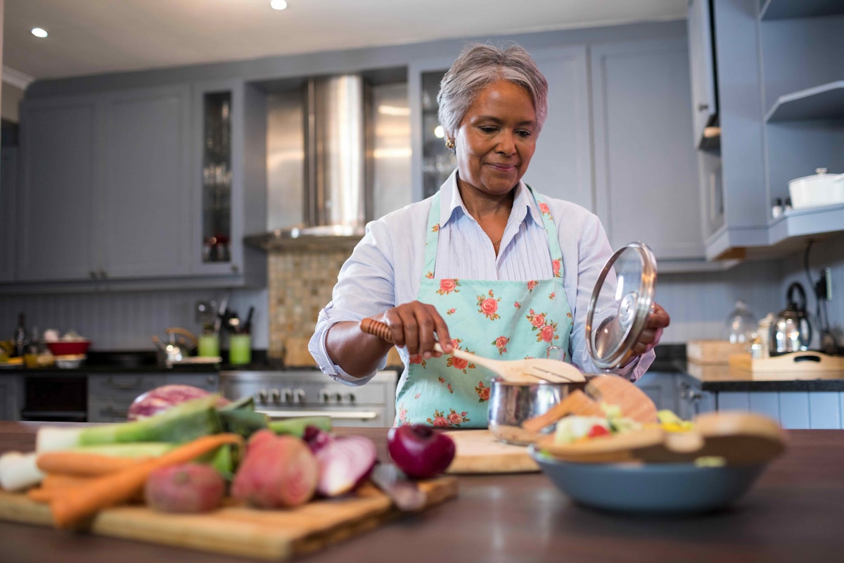 Elderly Woman Preparing Foods That Heal