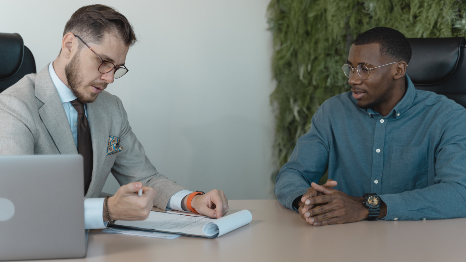 Caregiver of healthcare agency providing feedback to agency owner.