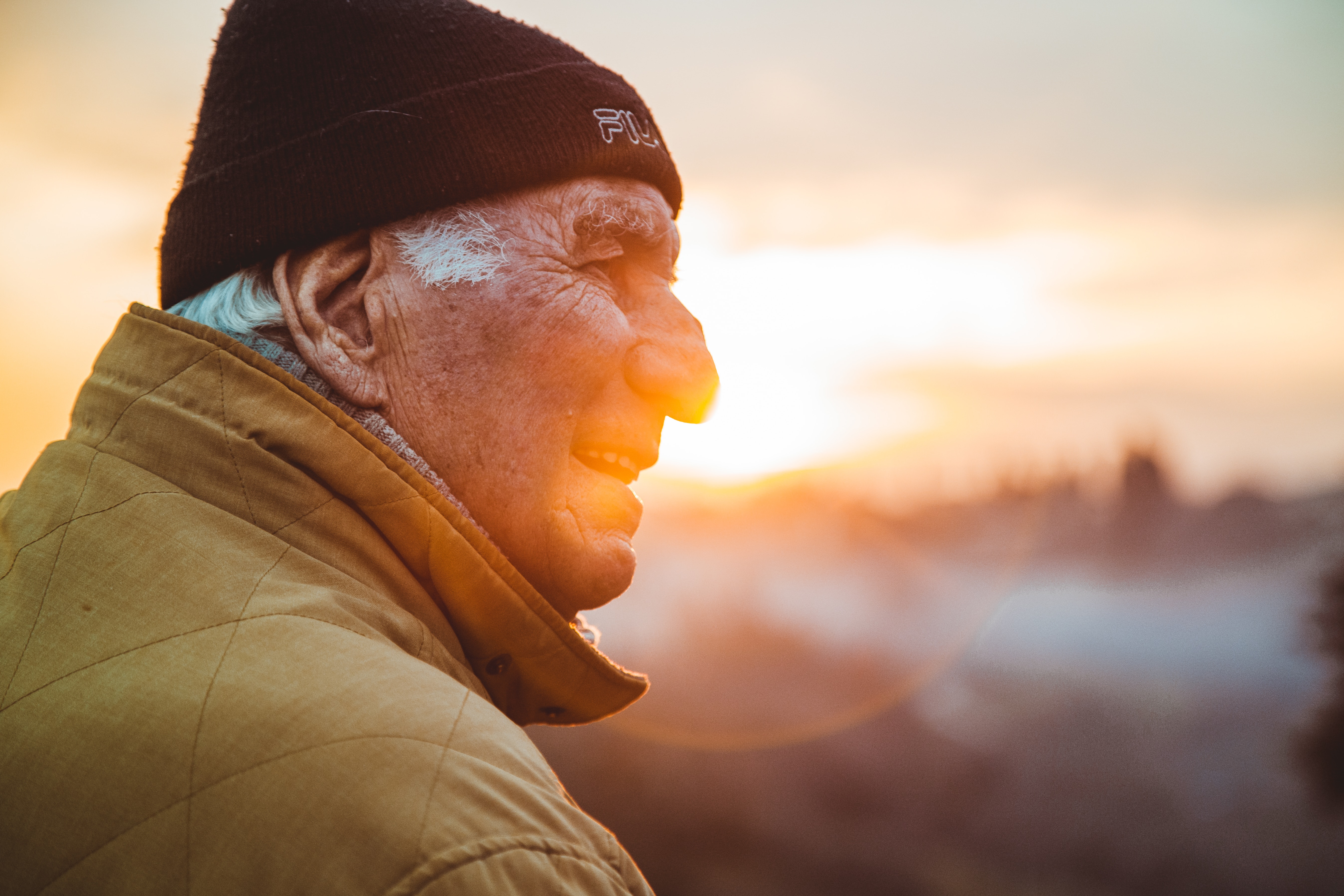 An elderly man during golden hour in the United States.