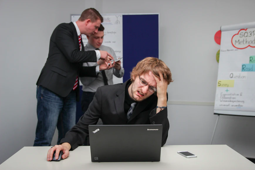 Man at computer feeling frustrated because he's doing strategic planning wrong.
