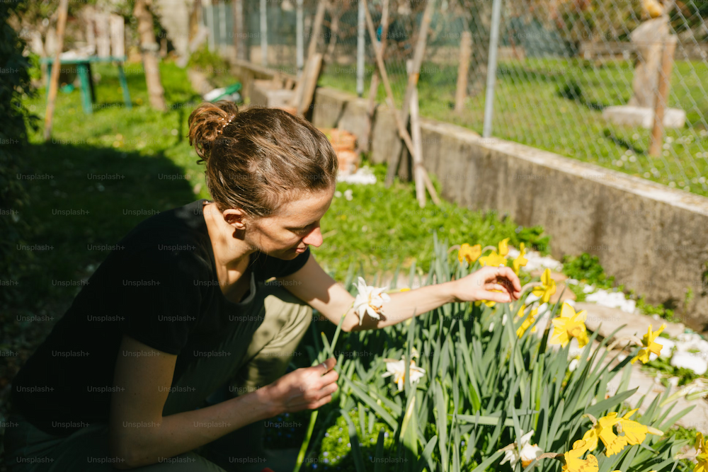 woman pruning flowers