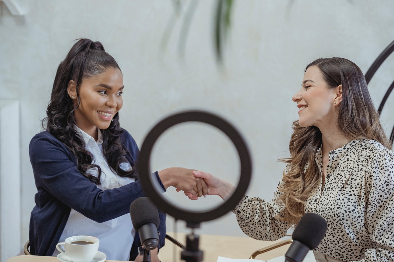 influencers shaking hands