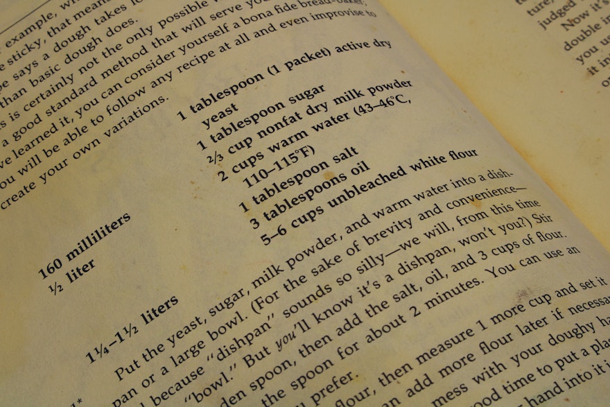 A recipe book listing the ingredients for cooking a dish.