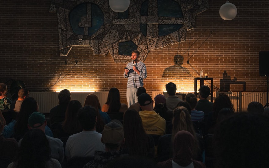man standing in front of a major audience