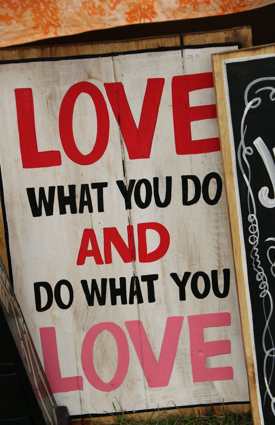 Sign showing the text " love what you do and do what you love", Photo by Nick Fewings on Unsplash