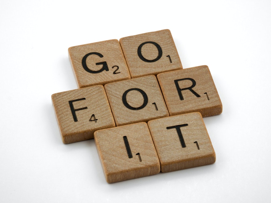 image of scrabble pieces forming "Go For It"