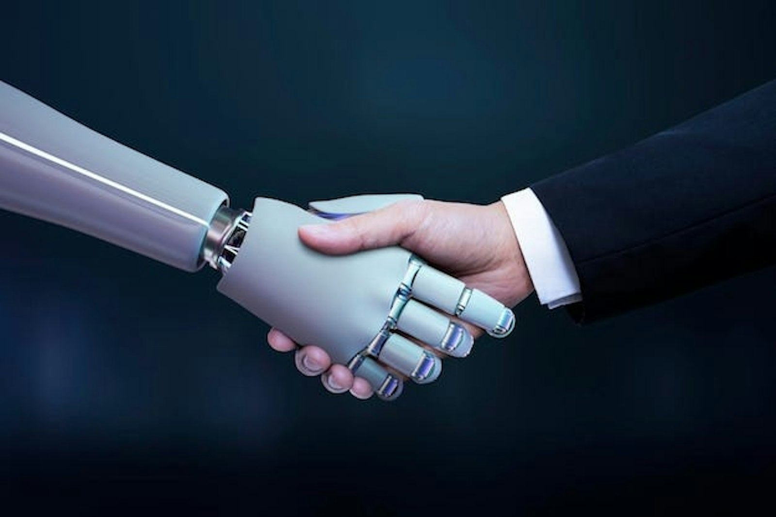 Symbolizing the future of M&A: a businessman shaking hands with a robotic hand, representing the integration of AI and automation in financial advisory and dealmaking