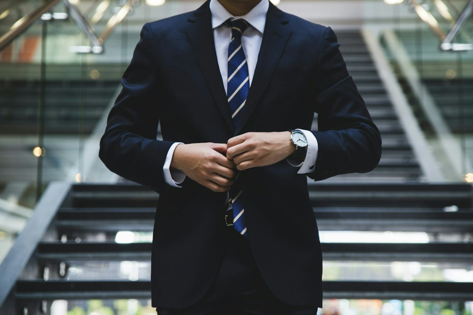 Team of outsourced investment banking analysts creating financial models and confidential M&A documents with advanced tools.