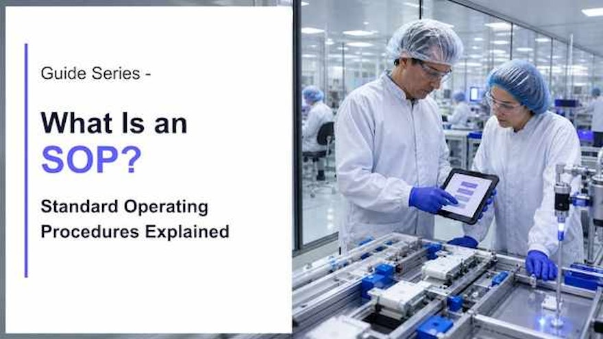 Operations and quality professionals reviewing a controlled standard operating procedure at the point of work