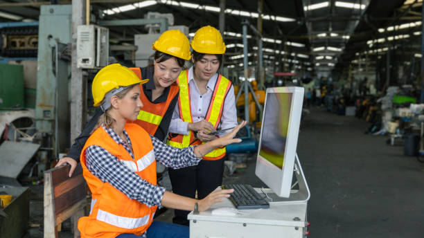 factory workers watching video work instructions