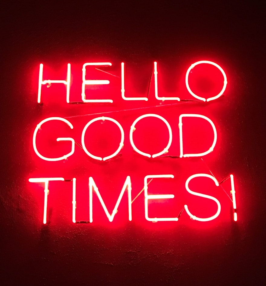 Image that reads hello good times in neon