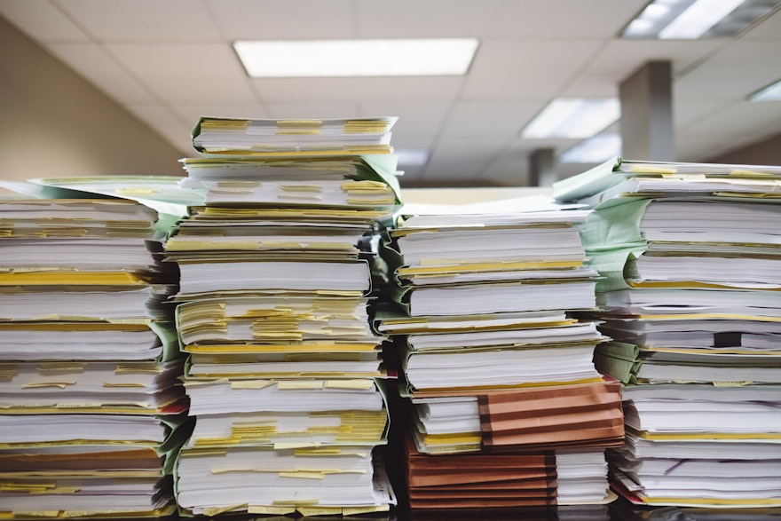 Stacks of paperwork to process