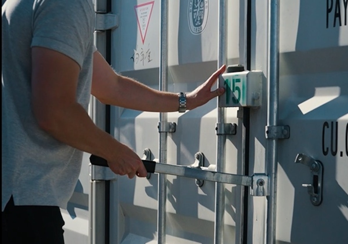 student opening storage container